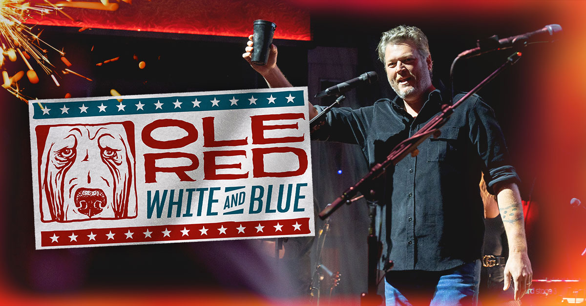Blake raising a cup on stage next to a logo reading "Ole Red, White, and Blue".